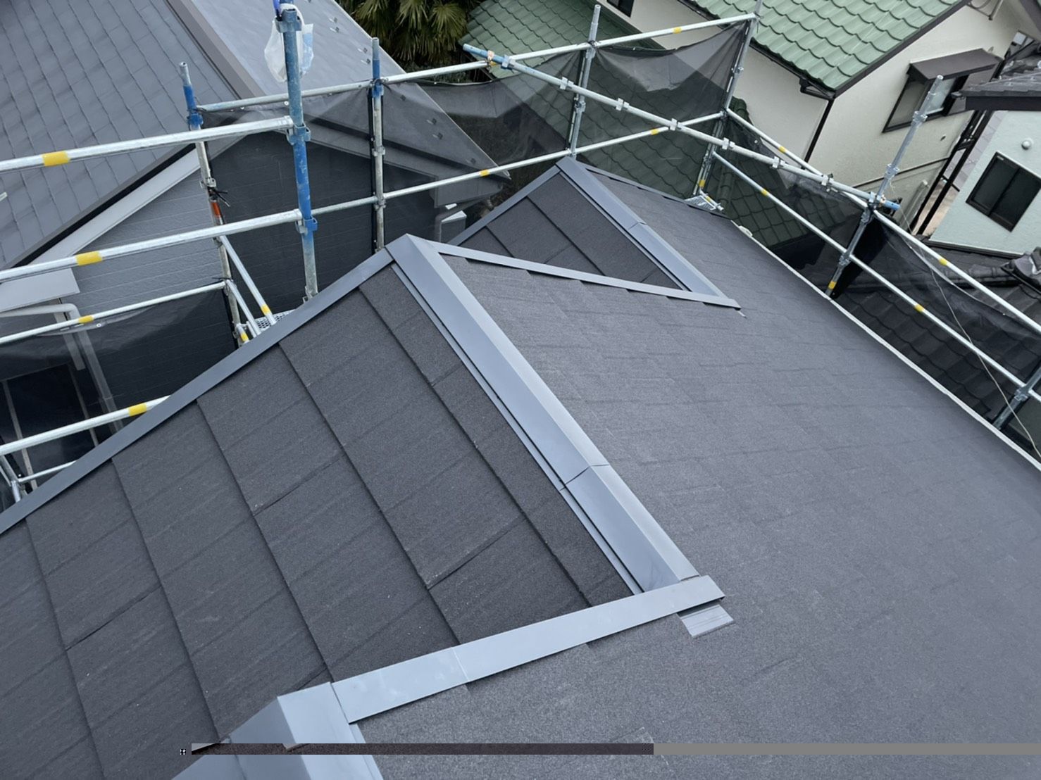 川崎市多摩区　ディプロマットスターへ　屋根葺き替え工事　ジンカリウム鋼板多摩区　葺き替え　ディプロマットスター